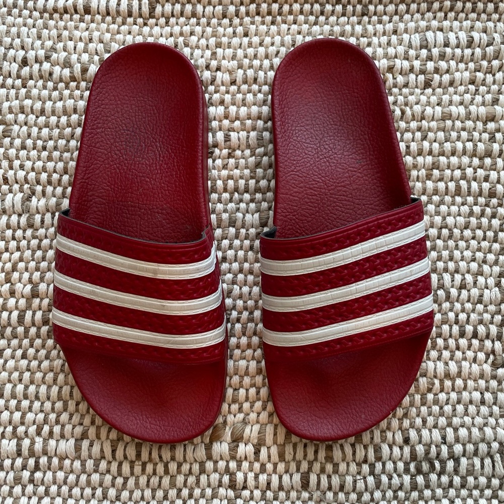 Red adidas rubber slides